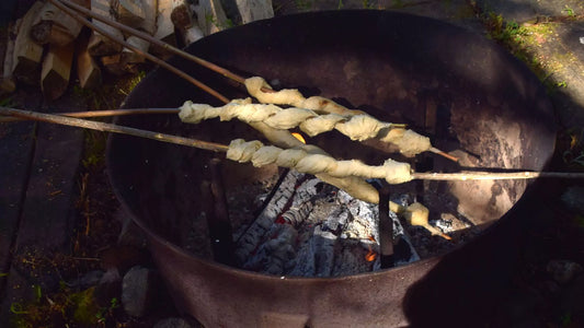 Natural Nordic Wild herb campfire bread on a stick